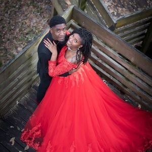 Red lace off the shoulder dress with long train